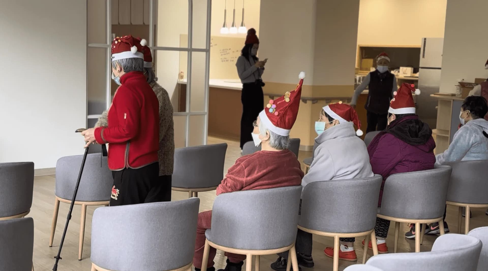 Celebrating Christmas with residents and staff at one of the centers